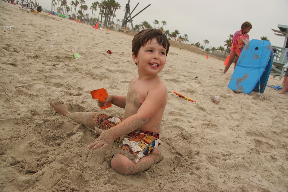 Kid Playing in Sand at Venice Beach